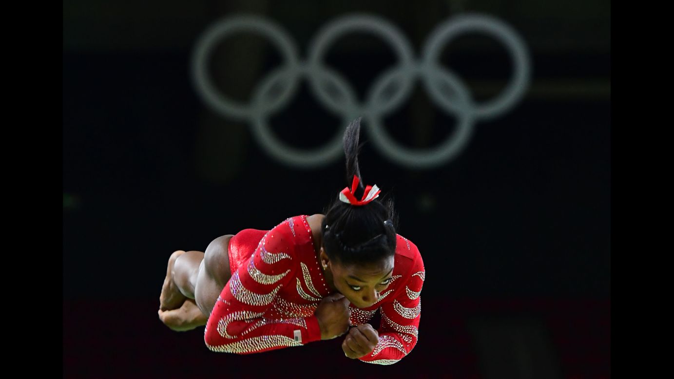 U.S. gymnast Simone Biles -- the reigning world champion in the all-around -- trains on the vault on Thursday, August 4.