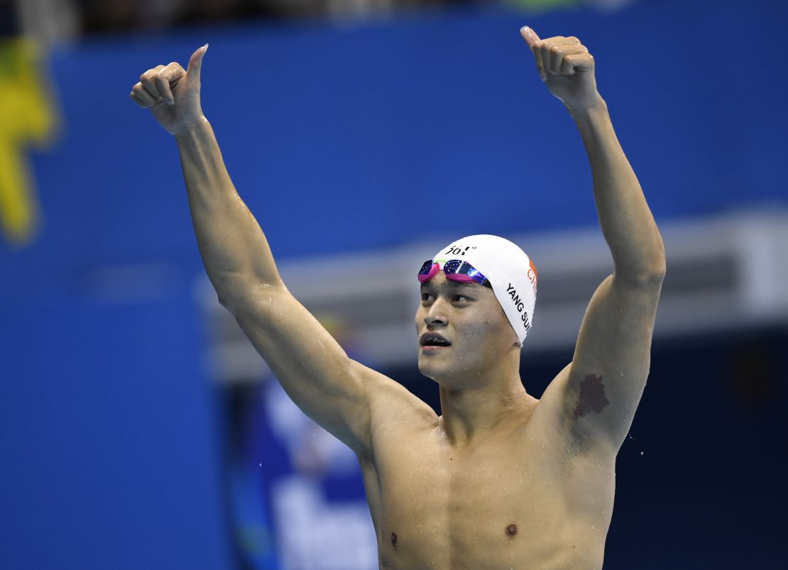 Sun Yang celebrates after winning the men's 200m freestyle.
