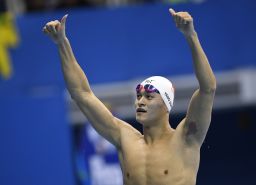 China's Sun Yang celebrates after he won the Men's 200m Freestyle Final 