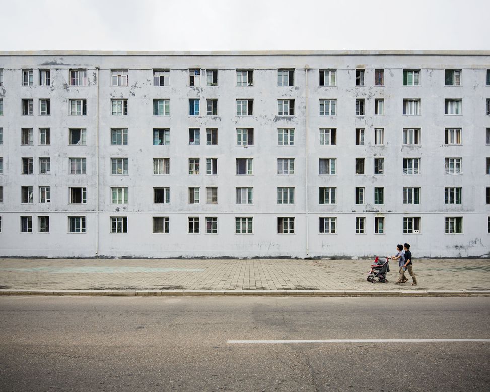 "The gray, minimal, and textured facade with grid-like windows was built by the Russians while helping North Korea to rebuild its capital after the Korean War.<strong> </strong>It seemingly has seen many winters, just like the people of this nation."