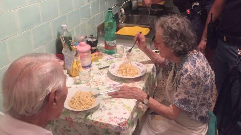 Roman police officers cook dinner for an elderly couple beset by loneliness
