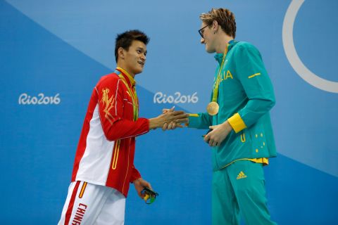 Silver medalist Yang Sun of China and gold medalist Mack Horton of Australia shake hands after the 400-meter swimming freestyle on Saturday, August 6. The Australian had <a href="http://edition.cnn.com/2016/08/06/sport/horton-yang-swimming-rio-olympics-day-one/" target="_blank">opened up a war of words</a> against his Chinese opponent in the buildup to the final, saying: "I don't have time or respect for drug cheats."