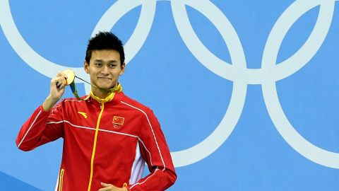 Gold medalist Yang Sun of China poses on the podium during the medal ceremony for the men's 200m freestyle on August 8.