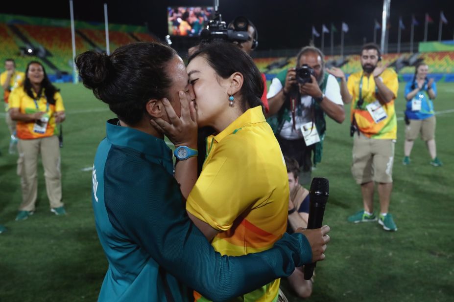 Rugby player Isadora Cerullo of Brazil, left, kisses Marjorie Enya, a volunteer at the Games, on Monday, August 8. <a href="http://edition.cnn.com/2016/08/09/sport/marriage-proposal-olympics-brazil/" target="_blank">Enya proposed to Cerullo</a> after the rugby sevens match between Australia and New Zealand.