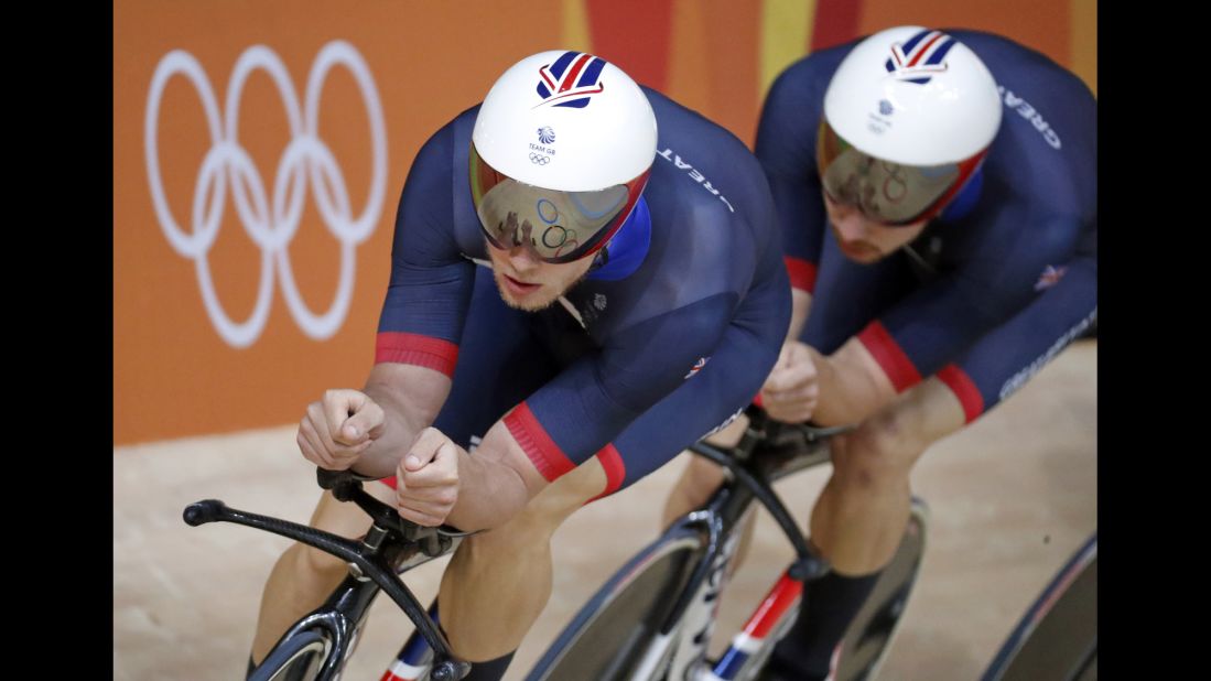 Track cyclists from Great Britain put their heads down during a training session inside the Olympic Velodrome.