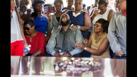 Brown was a recent high school graduate and was days away from starting college when he was killed. His father, Michael Brown Sr., cried out at his son's funeral in St. Louis. 
