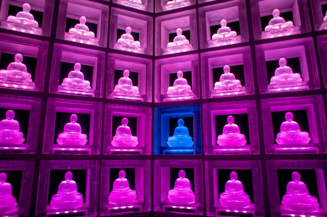 A  glass Buddha alter lights up inside the Ruriden columbarium in Tokyo, Japan. 
