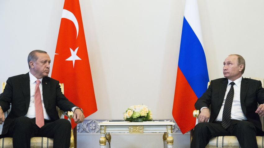 Turkish President Recep Tayyip Erdogan and Russian President Vladimir Putin meet outside St. Petersburg, Russia.