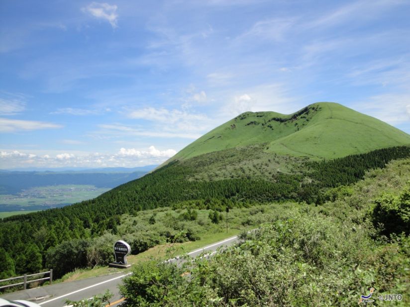 Mount Aso, Japan's largest active volcano, erupts regularly and offers stunning views of the area's landscapes.