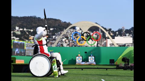 Iran's Zahra Nemati shoots an arrow during the women's individual archery competition.