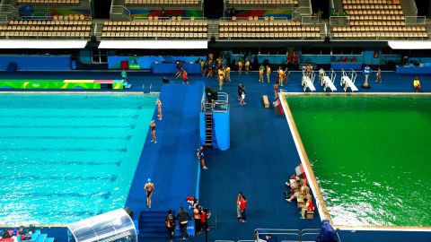 The diving pool, right, is seen on Tuesday, August 9. The pool had turned from <a href="http://www.cnn.com/2016/08/09/sport/rio-olympics-green-pool/" target="_blank">blue to green</a> since Monday.<br />