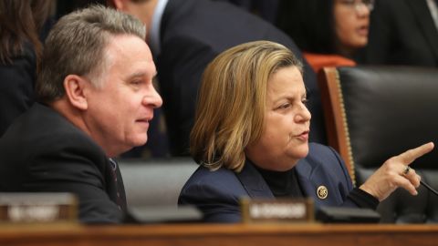 House Foreign Affairs Committee members Rep. Chris Smith (R-NJ) (L) and Rep. Ileana Ros-Lehtinen (R-FL) talk before a hearing about Cuba policy in the Rayburn House Office Building on Capitol Hill February 4, 2015 in Washington, DC.