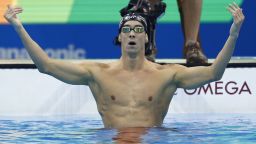 USA's Michael Phelps celebrates after he won the Men's 200m Butterfly Final during the swimming event at the Rio 2016 Olympic Games at the Olympic Aquatics Stadium in Rio de Janeiro on August 9, 2016.   / AFP / Odd Andersen        (Photo credit should read ODD ANDERSEN/AFP/Getty Images)