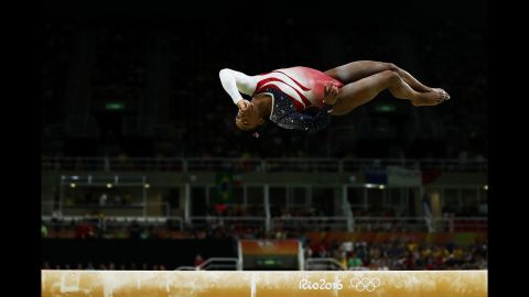 Experts call it the hardest balance beam dismount in gymnastics. Biles flips backward head-over-heels twice toward the end of the beam. Then she jumps backward off the end of the beam, flipping in mid-air twice before sticking the landing perfectly. 