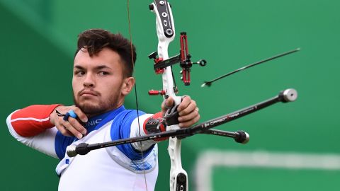 Italy's David Pasqualucci shoots an arrow during the individual archery competition.