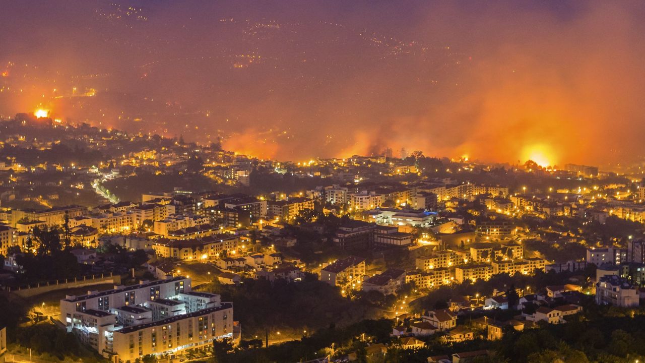 A wildfire threatens Funchal, the capital of Madeira, on Tuesday night.