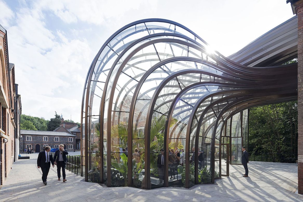 Heatherwick Studio worked with a team from the Royal Botanic Gardens at Kew to create the unique ecological environments required within the two structures. The glasshouses are made from more than 10,000 bespoke components.