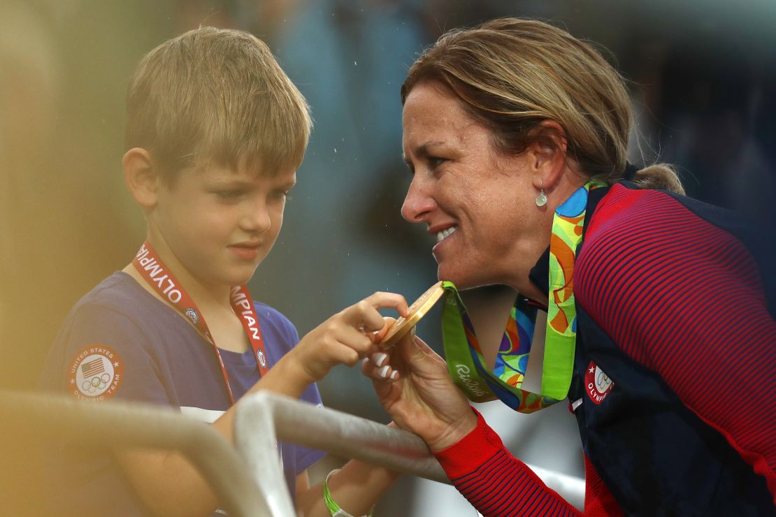 Kristin Armstrong celebrates with her 5-year-old son Lucas after winning gold.