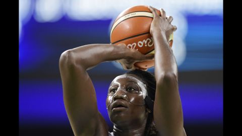 American basketball player Tina Charles shoots a free throw against Serbia.