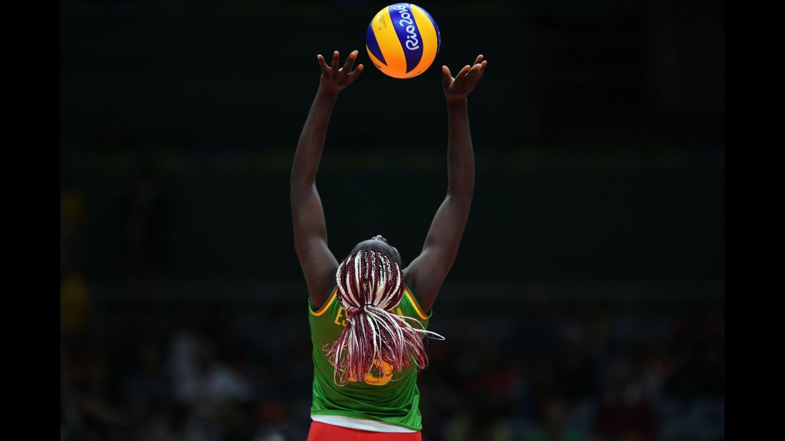 Madeleine Samantha Bodo Essissima plays a shot for Cameroon during a volleyball match against Russia.