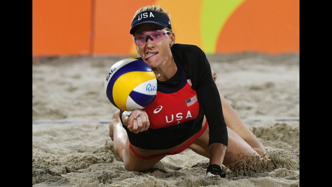 U.S. beach volleyball player Kerri Walsh Jennings dives for a ball during a qualifying match.