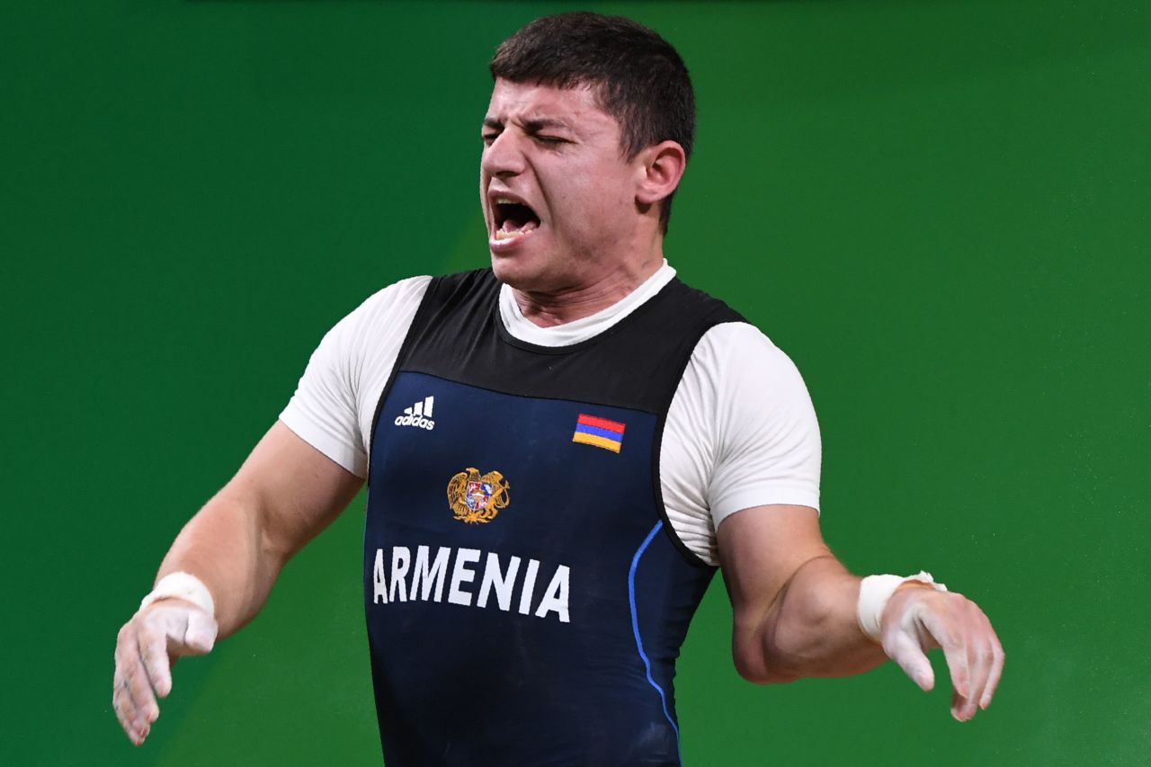 The 77kg European champion, Karapetyan was clearly in agony after suffering the injury during his second lift at 195kg.