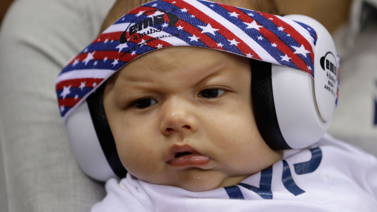 Michael Phelps' son Boomer wears ear protection during the swimming events at the Rio Olympics.