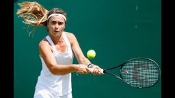 In this file photo taken on June 17, 2014 Gabriella Taylor of Great Britain faces Sofia Arvidsson of Sweden on day two of the Wimbledon Championships Qualifying at the Bank of England Sports Centre in London, England.