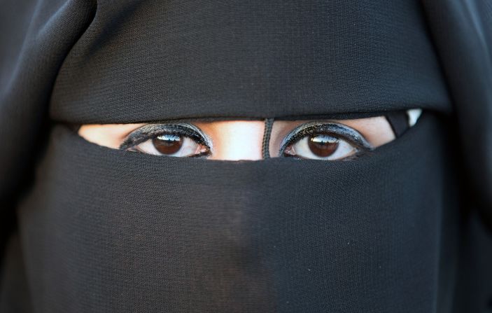 <strong>Niqab: </strong>The full-face veil exposes only the eyes. A Palestinian bride in Jericho wears this one.