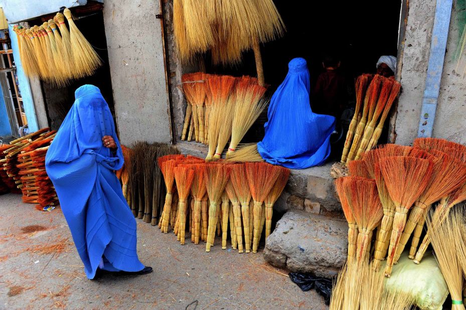 <strong>Burqa:</strong> This full-body garment has a mesh over the eyes. The burqa is widely used in Afghanistan and was required under the Taliban. These Afghan women are shopping in Herat.