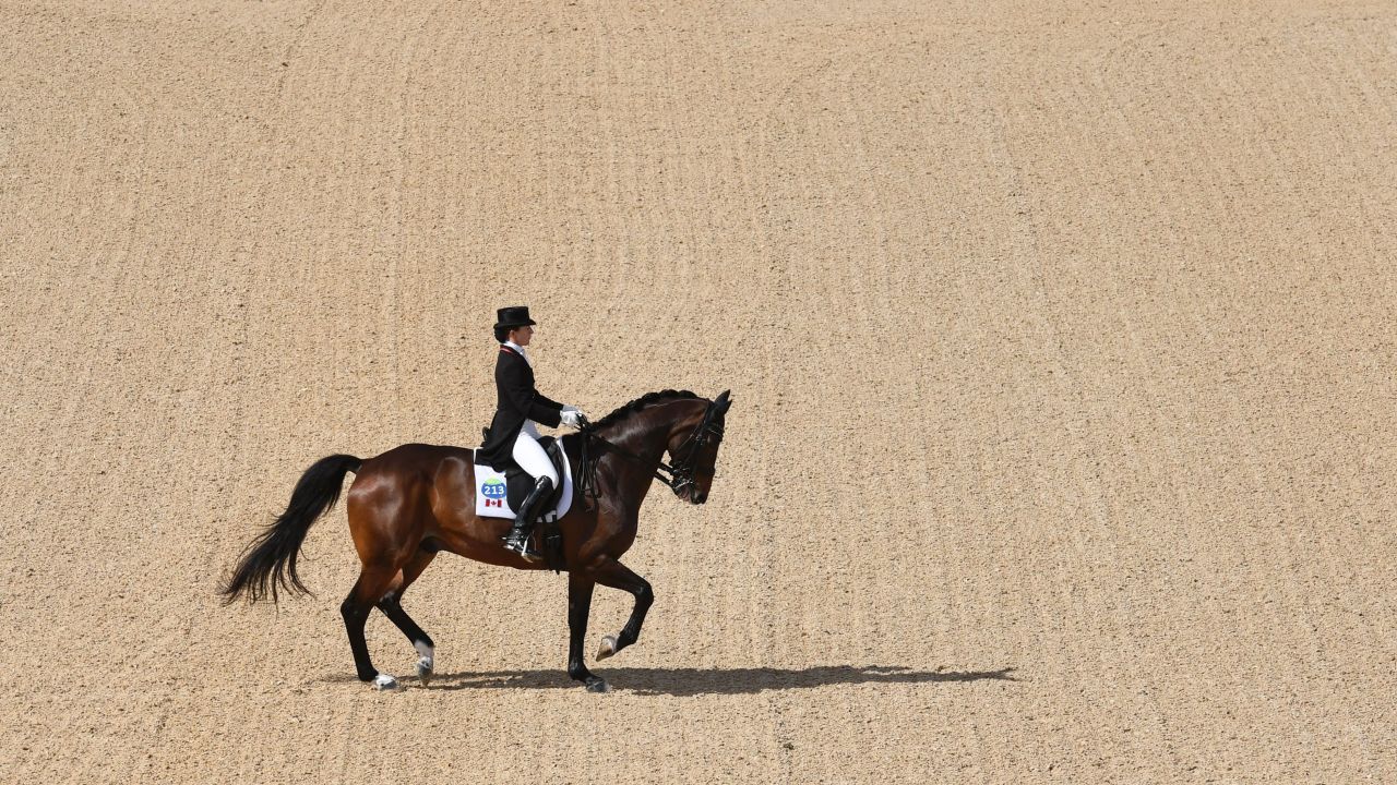 Canada's Belinda Trussell performs a routine during the dressage Grand Prix event.