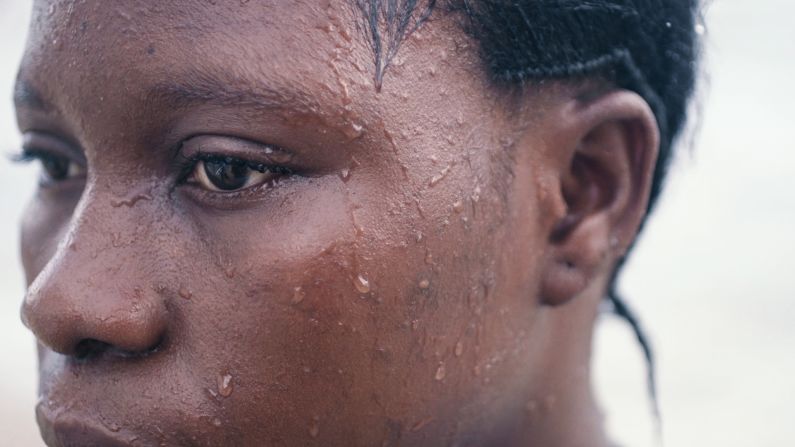 KK's father died in 2014 (from a non-Ebola related cause), meaning along with her studies she supports her family, helping to sell groceries and making hats and tote bags to tout to Bureh's few tourists.