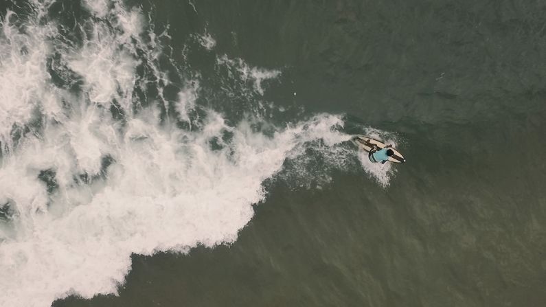 Kadiatu Kamara, known as KK, is the only female surfer in Sierra Leone. Living in Bureh, south of the capital Freetown, the coastal village has one of the only surf breaks in the country.