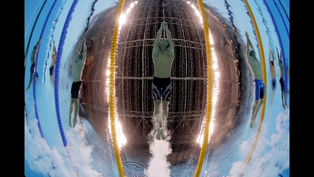 American Nathan Adrian swims the 100-meter freestyle on Tuesday, August 9. "It's a very time-consuming, tedious operation to get things correct," Bello said of underwater photography. "There's a lot of setup way, way, way ahead of time."