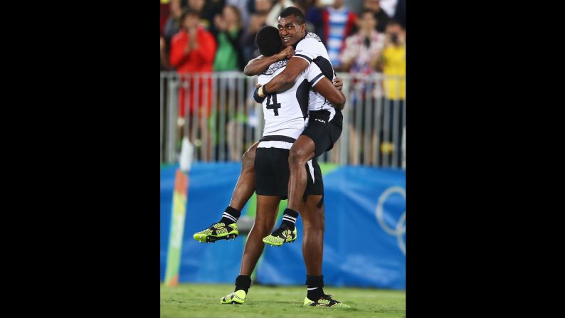 Apisai Domolailai and Viliame Mata celebrate after Fiji <a href="index.php?page=&url=http%3A%2F%2Fwww.cnn.com%2F2016%2F08%2F11%2Fsport%2Ffiji-rugby-olympics-sevens-rio-2016%2Findex.html" target="_blank">won its first-ever Olympic medal</a> with a 43-7 victory over Great Britain in the rugby sevens final.