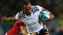 Fiji's Osea Kolinisau scores a try in the men's rugby sevens gold medal match between Fiji and Britain during the Rio 2016 Olympic Games.