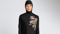 In a recent undated handout picture released by British retailer Marks and Spencer on April 8, 2016 a model poses wearing one of Marks and Spencer's full-body bathing suit or burkini suit.
From young start-ups to business giants, British entrepreneurs are eyeing a rapidly expanding global market for Muslim consumers with a range of brands from clothes to greetings cards to online gym courses. In contrast to France, where there has been an angry debate about Muslim-specific consumer products, the approach in Britain seems more business-minded. For example, famous names like the Marks & Spencer department store chain now offer Islamic fashion products.   / AFP PHOTO / MARKS AND SPENCER / Handout / RESTRICTED TO EDITORIAL USE - MANDATORY CREDIT  " AFP PHOTO / MARKS AND SPENCER "  -  NO MARKETING NO ADVERTISING CAMPAIGNS   -   DISTRIBUTED AS A SERVICE TO CLIENTS HANDOUT/AFP/Getty Images