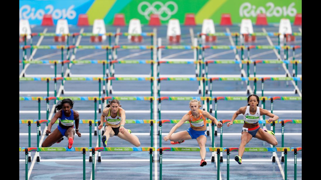 From left, Cuba's Yorgelis Rodriguez, Germany's Claudia Rath, the Netherlands' Anouk Vetter and Great Britain's Katarina Johnson-Thompson compete in the 100-meter hurdles during the heptathlon.
