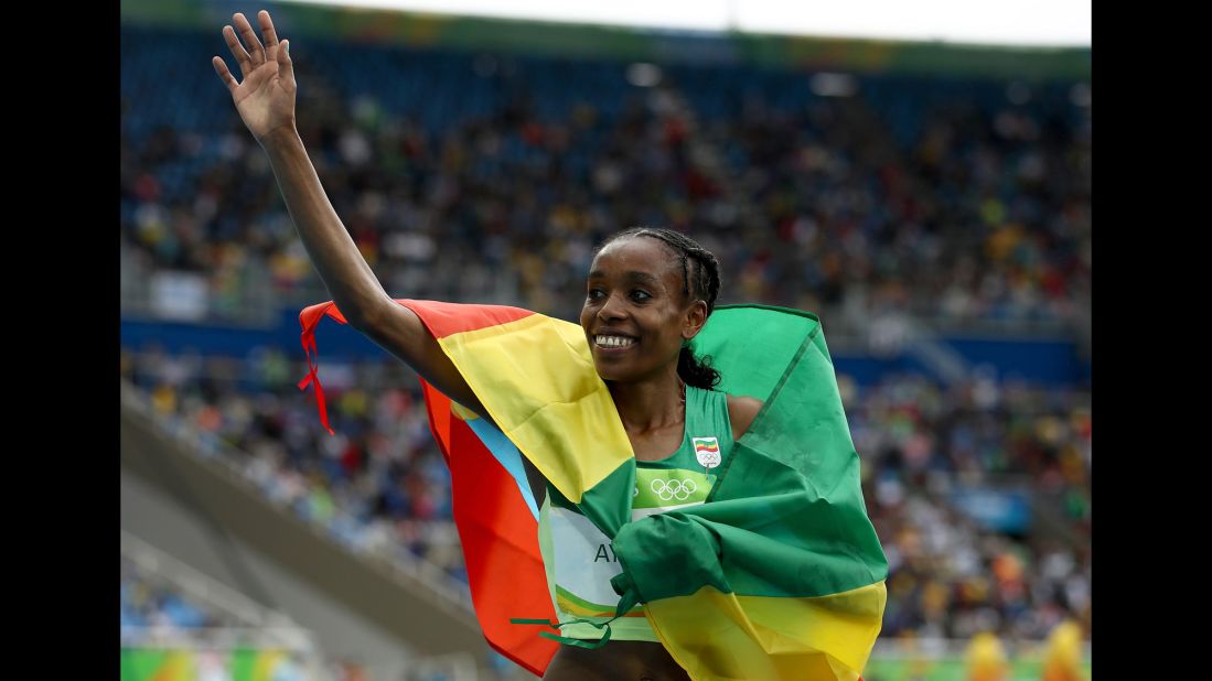 Ethiopia's Almaz Ayana celebrates after winning the 10,000 meters. She stunned spectators by crossing the line in 29 minutes, 17.45 seconds, <a href="http://www.cnn.com/2016/08/12/sport/rio-olympics-ethiopia-10000m-world-record/index.html" target="_blank">smashing a record</a> that had stood for nearly 23 years.