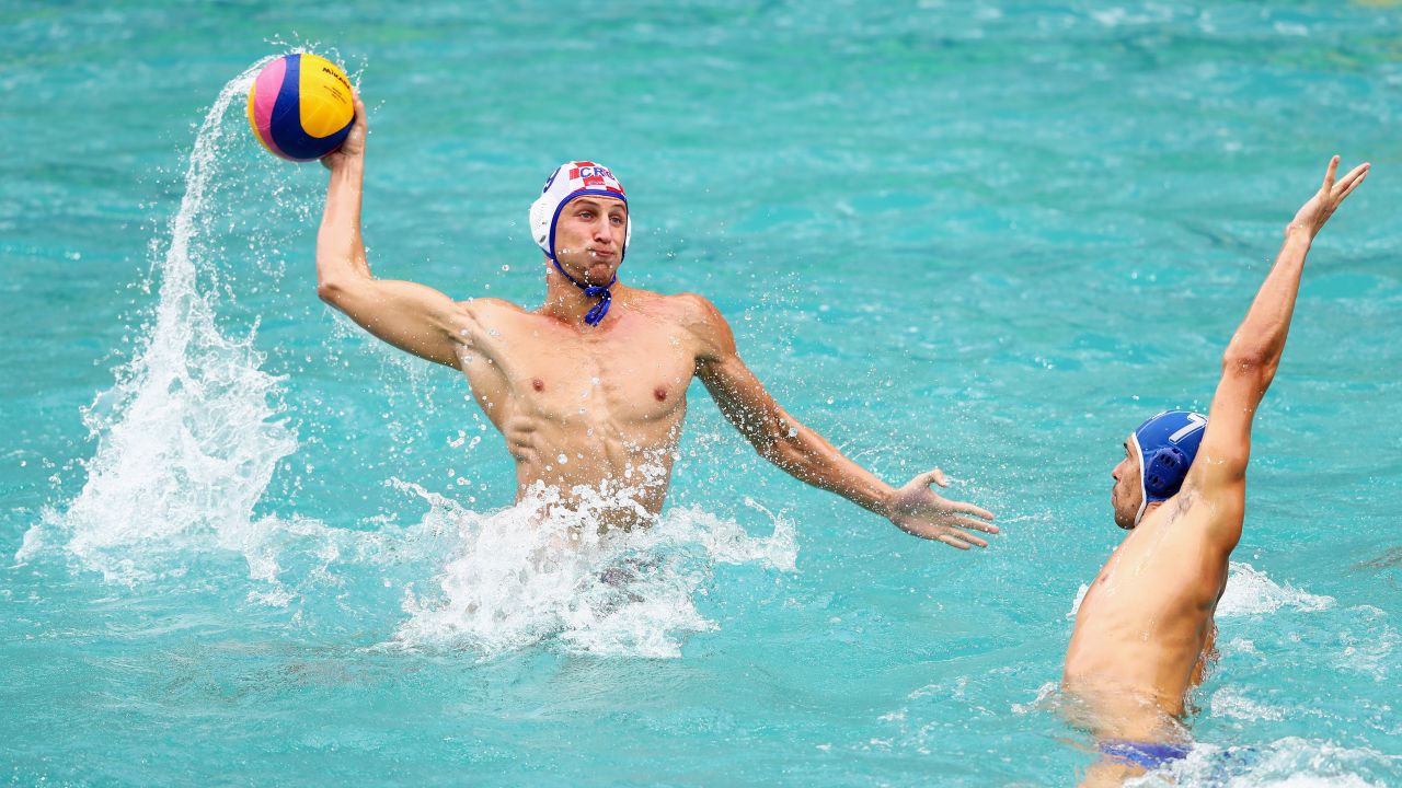 Croatia's Sandro Sukno shoots on goal during a water polo match against Italy. Croatia won 10-7.