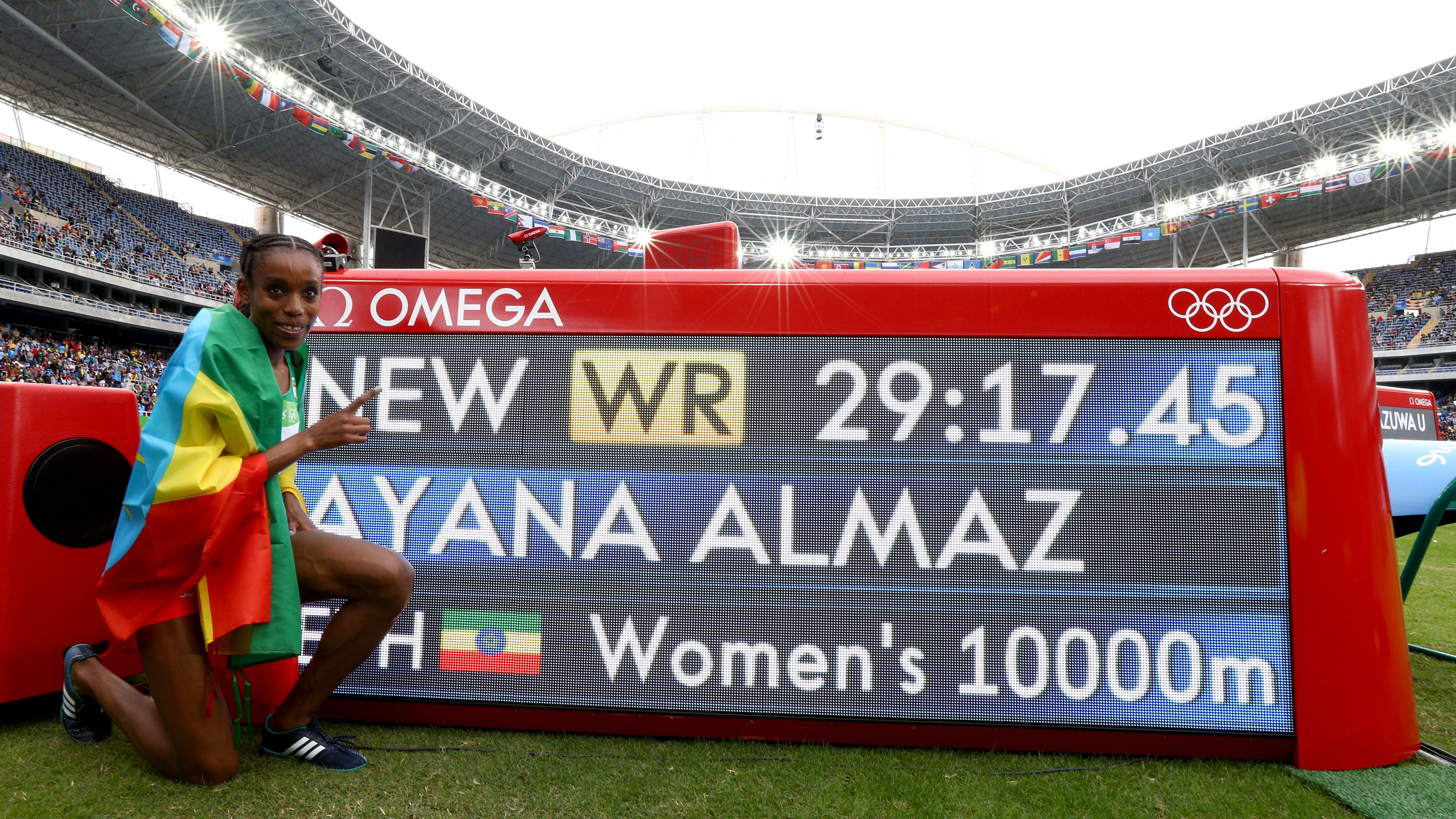 Ethiopia's Almaz Ayana celebrates winning the women's 10,000m final.