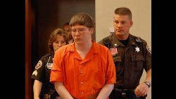Brendan Dassey is escorted into court for his sentencing Thursday, Aug. 2, 2007, in Manitowoc, Wis. Dassey, a teenager convicted of helping his uncle rape and kill a woman, was sentenced to life in prison on Thursday with the possibility of parole in 41 years. (AP Photo/Eric Young, Pool)