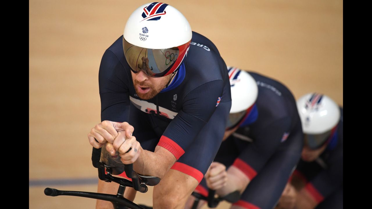 Wiggins leads British teammates Edward Clancy and Steven Burke in the men's team pursuit qualifying track cycling event at the 2016 Olympic Games in Rio.