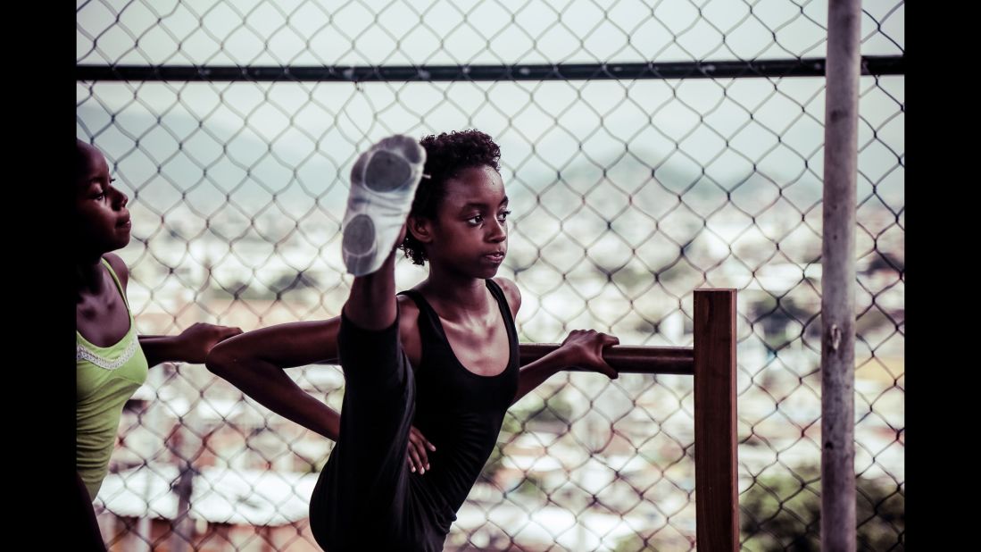 Karla, 12, practices a ballet movement.