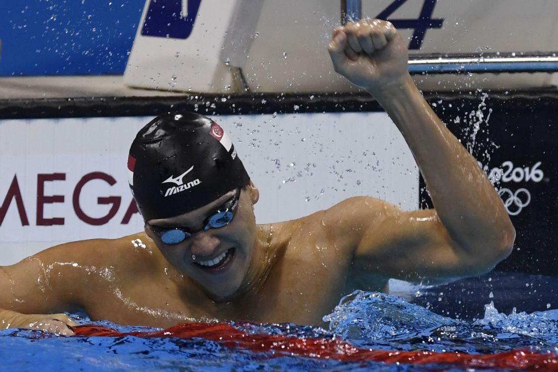 Singapore's Joseph Schooling celebrates after the men's 100m Butterfly Final during the swimming event at the Rio 2016 Olympic Games.