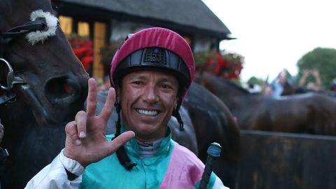 Frankie Dettori celebrates after riding his 3000th British winner on Predilection at Newmarket.