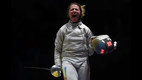 Ukraine's Olga Kharlan celebrates after her team won their sabre fencing quarterfinal bout against South Korea.