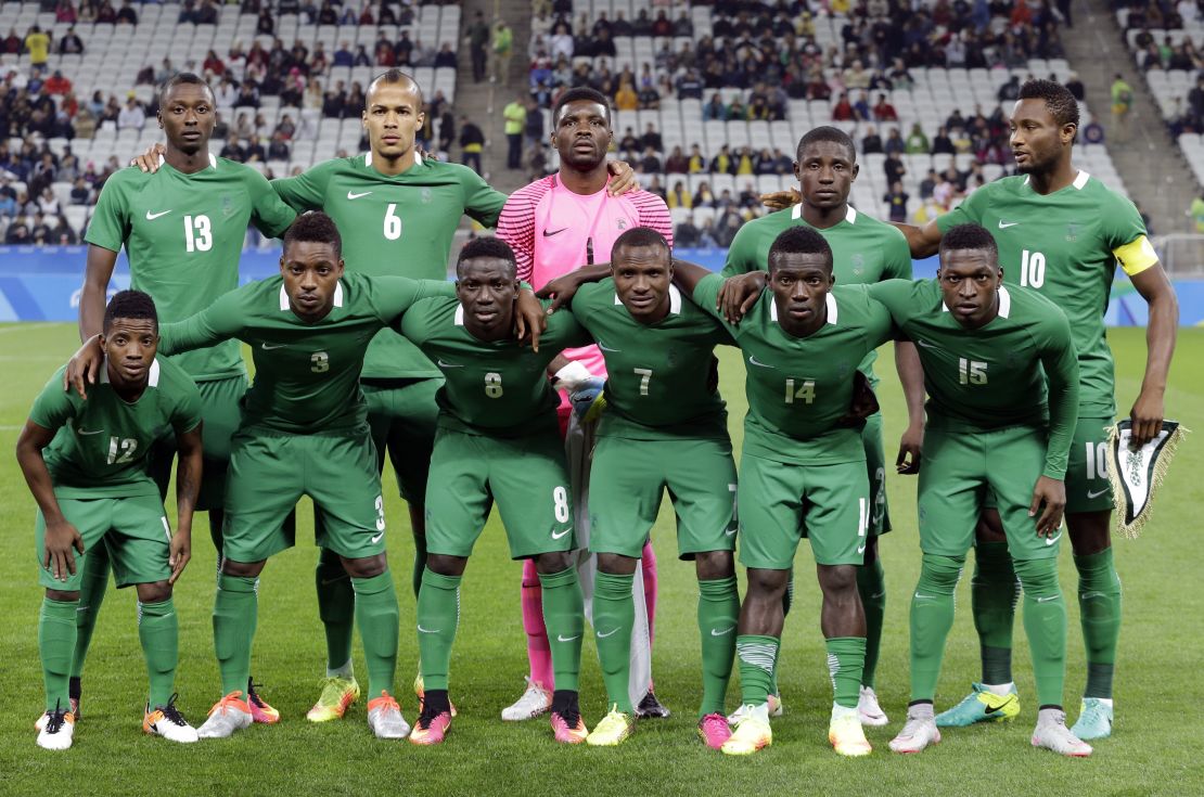 The Nigerian team poses for photos before a match of the men's Olympic football tournament between Colombia and Nigeria in Sao Paulo, Brazil, on Wednesday, August 10, 2016. 
