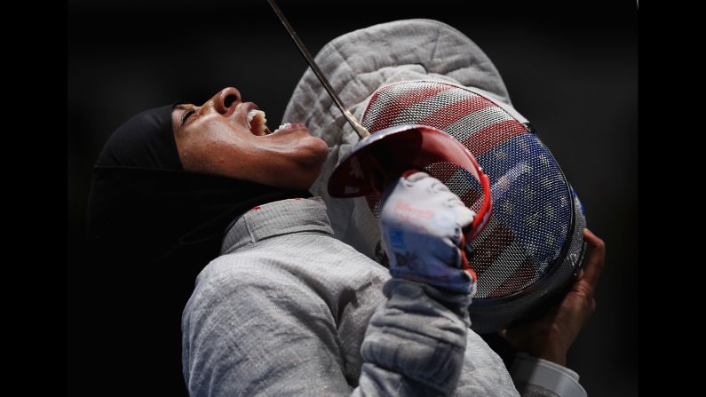 American fencer Ibtihaj Muhammad reacts during the women's saber team semifinal against Sofya Velikaya of Russia. The US went on to win bronze.