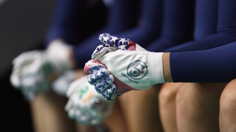 Patriotic gloves are worn by Team USA as they prepare to compete in the women's track cycling team pursuit.